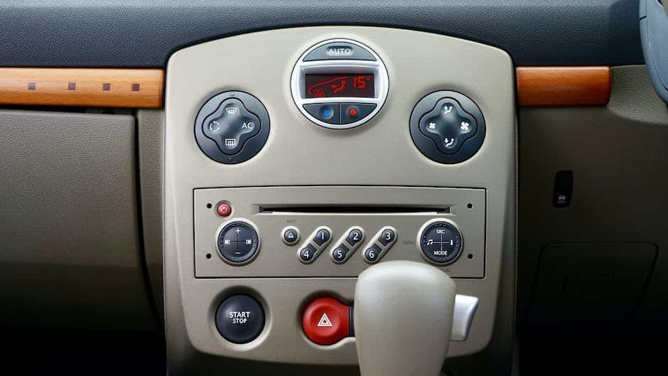 Image of a person customizing an infotainment system in a car