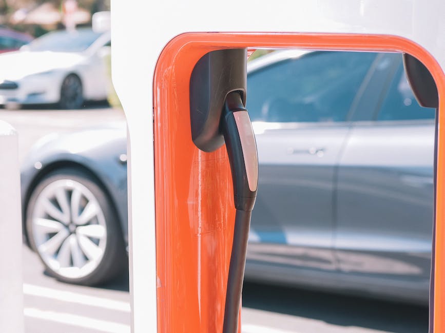 Image of activating Sentry Mode on a Tesla, with the car parked and the touch screen interface showing the steps outlined in the guide.